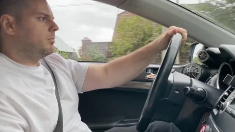 Driver behind the wheel, a person in a school zone, reminding us of the nee.. Stock Footage 252379986