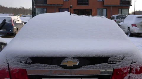 Driver brush cleans the rear window of the vehicle with the luggage compartment Stock Footage 67402093