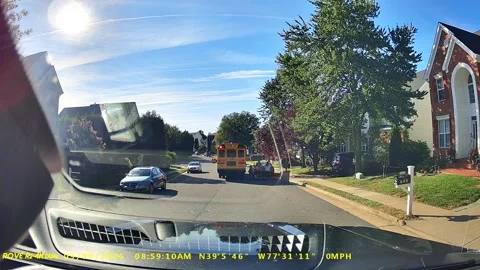 Driver Called Out For Passing a Stopped School Bus, Leesburg, Virginia, USA - 07 Stock Footage 345756799
