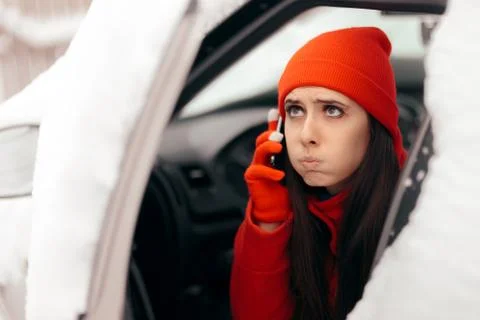 Driver Calling for Help after Car Breakdown in Winter Snow Stock Photos