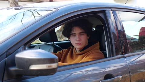 The driver of the car behind the wheel Stockbeeldmateriaal 271071627