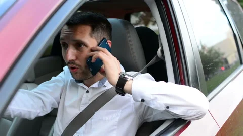Driver of a car being bored sitting in his vehicle waiting. Stock Footage 93756564