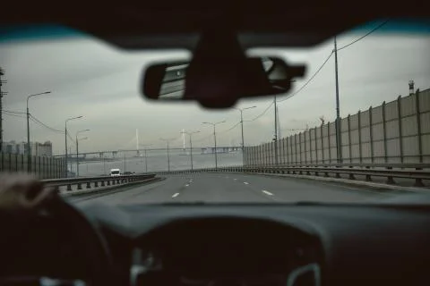 The driver of the car is going to look at the road Stock Illustration