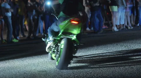 Driver catch his motorbike while its drifting Stock Footage 62649101