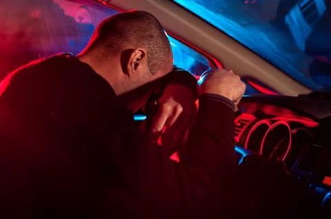 Driver is caught driving under alcohol influence Stock Photos