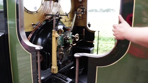 Driver Climbing Onto Small Steam Train Footplate Vídeo Stock 116093919