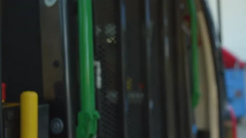 A driver closing the back door of the car with the disability sticker Stock Footage 135101321