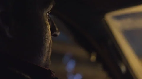 Driver concentrating on road during nighttime commute Stock Footage 315068306