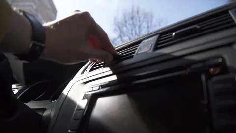 The driver controls the direction of movement of ventilation and air Stock Footage 265236200