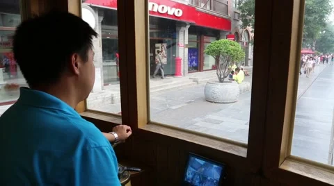 Driver controls the retro tram running down the Qianmen street, Beijing Stock Footage 57468811