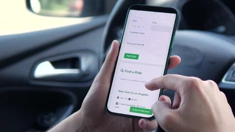 A driver creates a rideshare offer in-app, filling in details and publishing Stock Footage 315090964