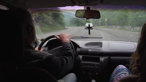 Driver with cross in the car Stock Footage 141952877