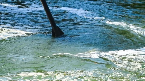 The driver digs the ground with a dredger Stock Footage 328832120