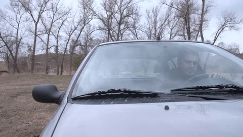 The driver is disappointed, can not start your car, breakage. Stock Footage 108157286