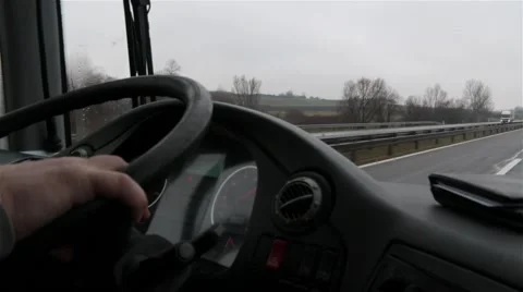 Driver Drive Bus On Highway,Inside View On Dashboard, Hand On Steering Wheel Stock Footage 48221715