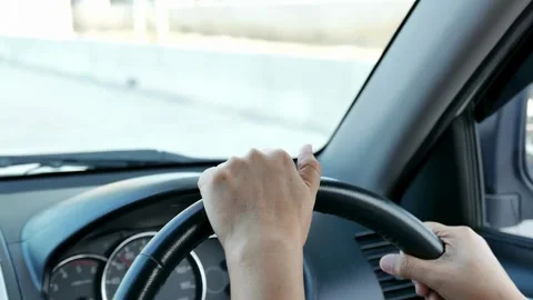 Driver driving a car on asphalt road in summer day. Concept of driving a car. Stock-Footage 336266984