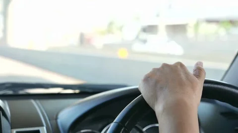 Driver driving a car on asphalt road in summer day. Concept of driving a car. Stock-Footage 336267055