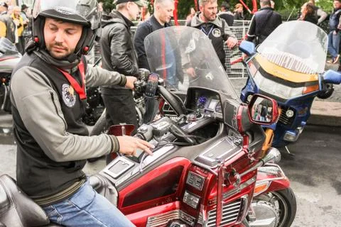Driver driving a motorcycle. Stock Photos