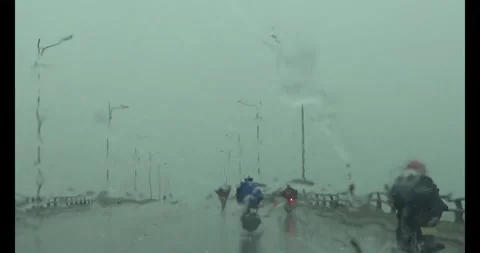 Driver driving in the rain. The heavy rain obscured visibility. Stock Footage 310652069