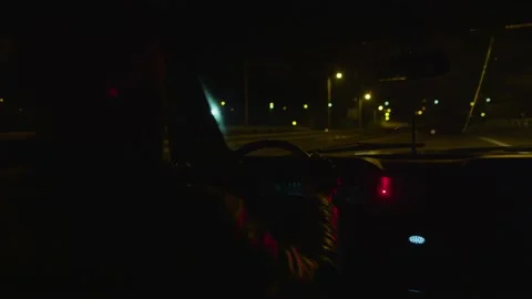 DRIVER IN EMPTY STREETS BY NIGHT Stock Footage 145153598