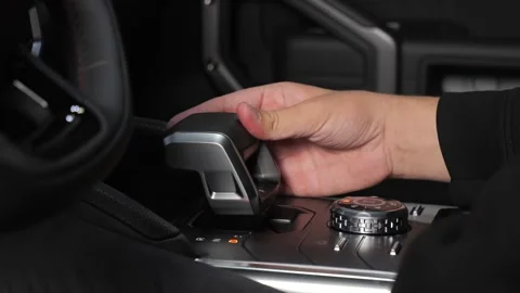  The driver examines the interior of a new car with a black interior. Stock Footage 278603997