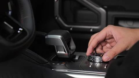  The driver examines the interior of a new car with a black interior. Stock Footage 278604002