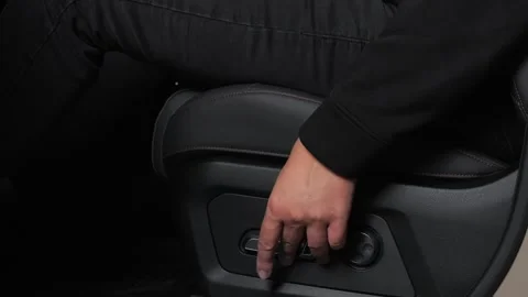  The driver examines the interior of a new car with a black interior. Stock Footage 278604019