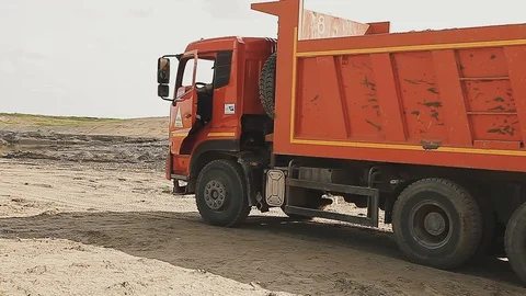 The driver examines the truck. Stock Footage 129607821