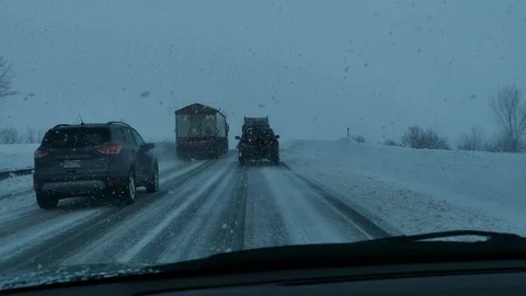 Driver filming snowfall Stock Footage 105304461