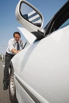 Driver Fixing Engine Breakdown Of White Car With Open Hood Stock Photos