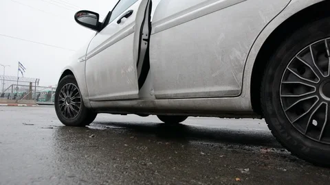 Driver gets out of the car  Video stock 123100482