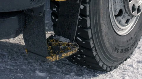 The driver gets in the vehicle. The driver sits into a truck. He climbs the step Stock Footage 199486737