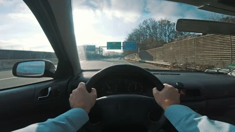 Driver goes fast in car on the freeway seem from point of view Stock Footage 98649962