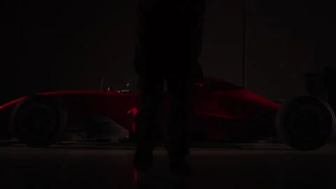 Driver going toward his race car Stock Footage 264410232