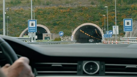 Driver Hand and Car Board. Entering a Tunnel Stock Footage 91293737