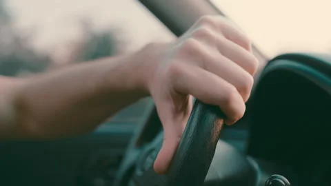 Driver hand hitting steering wheel in anger close up shot. Aggressive concept Stock Footage 296302984
