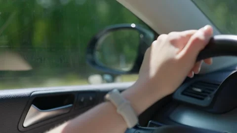Driver Hand on Steering Wheel in Car Slow Motion Видео 346370591