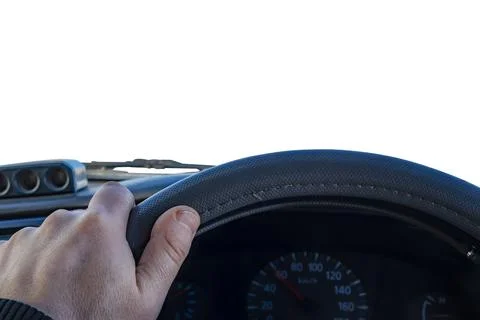 Driver hand on the steering wheel inside the car Stock Photos