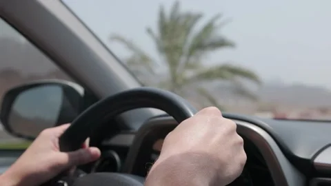 Driver hands on the wheel of the modern car Stock Footage 162772743