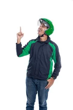 Driver with helmet pointing Stock Photos