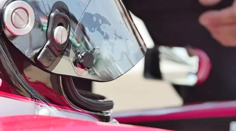 Driver helmet racetrack Stock Footage 64314821