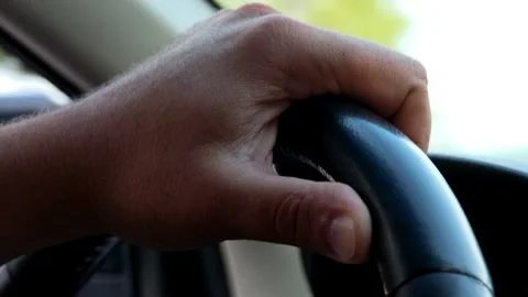 Driver Holding Steering Wheel, Multiple Shots Vidéo 315361342