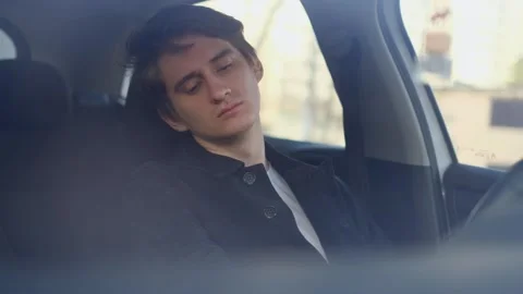 The driver is hot in the car because the climate control is not working Stock Footage 304007508