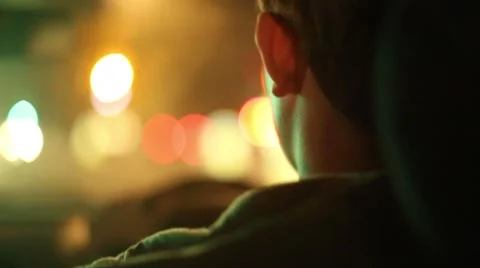 Driver Illuminated by City Lights Stock Footage 46723891