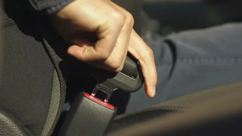 Driver insert seat belt Stock Footage 99907068