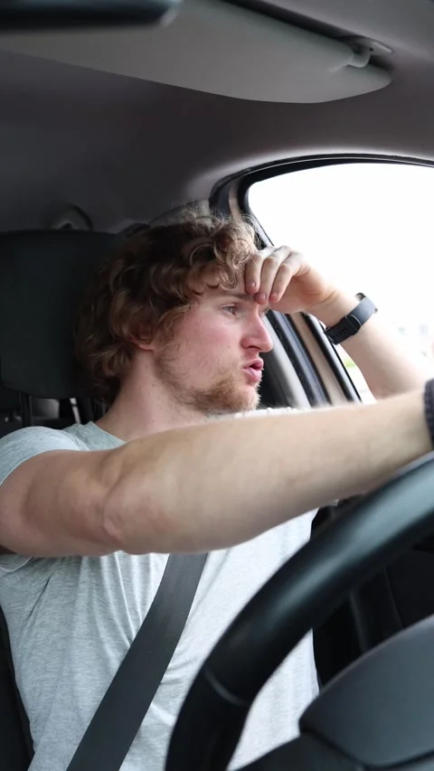 Driver loses his temper after another motorist suddenly cuts him off Stock Footage 342922051