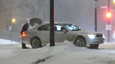Driver lost control during snowfall Stock Footage 125421407