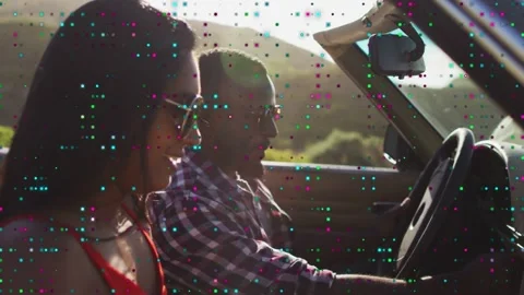 Driver lowering map onto dash after glancing forward, woman adjusting sunglasses Stock Footage 333233627