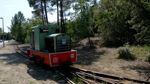 Driver making a maneuver with Saint Trojan Les bains Little train. Stock Footage 120641729
