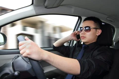 Driver on mobile phone Stock Photos